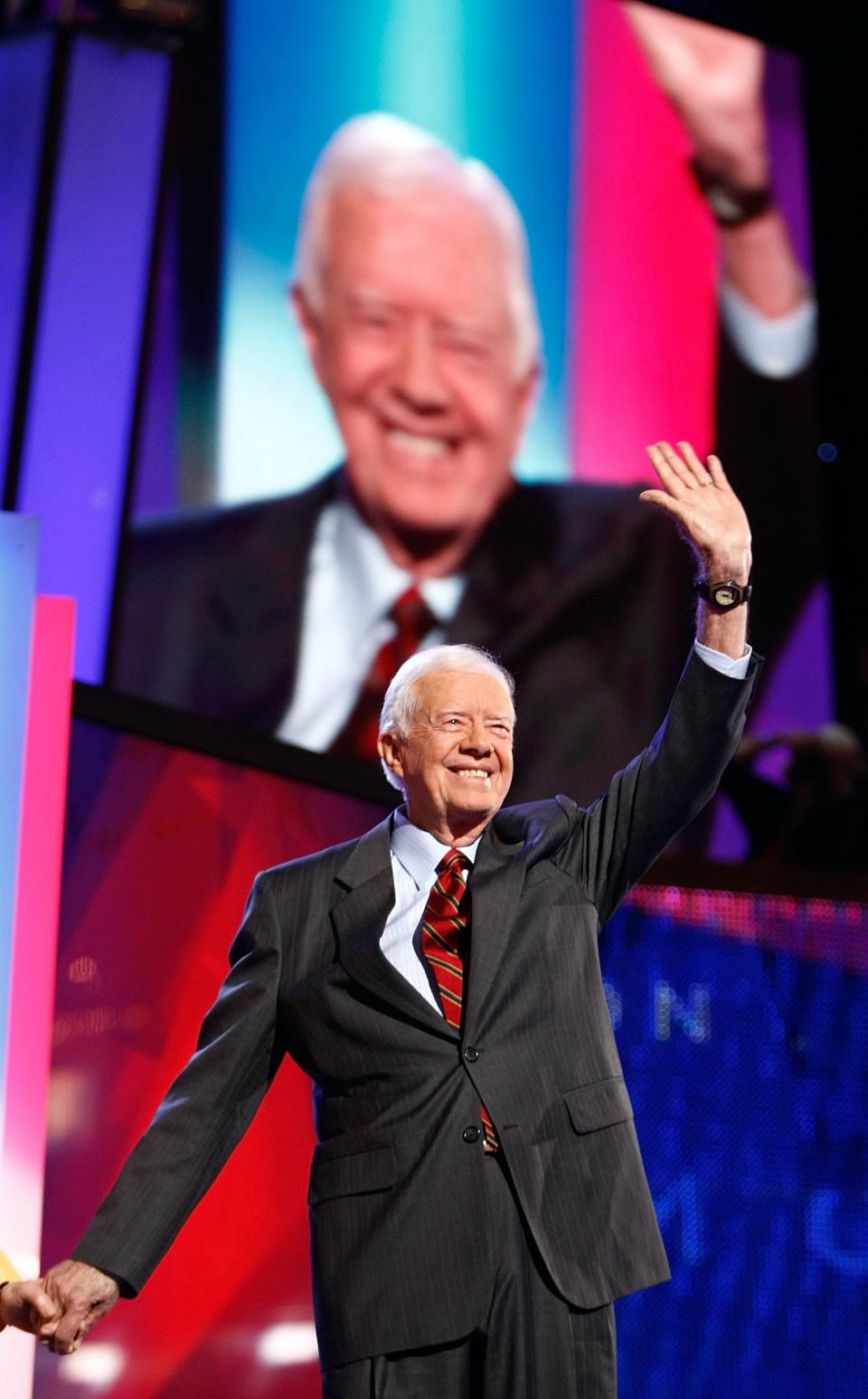 Former President Jimmy Carter takes the stage during the Democratic National Convention in 2008. <a href="https://www.gettyimages.com/detail/news-photo/former-u-s-president-jimmy-carter-walks-on-stage-during-day-news-photo/82547453?adppopup=true" rel="nofollow noopener" target="_blank" data-ylk="slk:Chip Somodevilla/Getty Images News via Getty Images;elm:context_link;itc:0;sec:content-canvas" class="link ">Chip Somodevilla/Getty Images News via Getty Images</a>