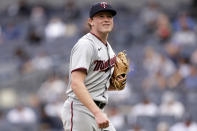 Minnesota Twins pitcher Louie Varland reacts walking back to the dugout during the sixth inning of the first baseball game of a doubleheader against the New York Yankees on Wednesday, Sept. 7, 2022, in New York. (AP Photo/Adam Hunger)