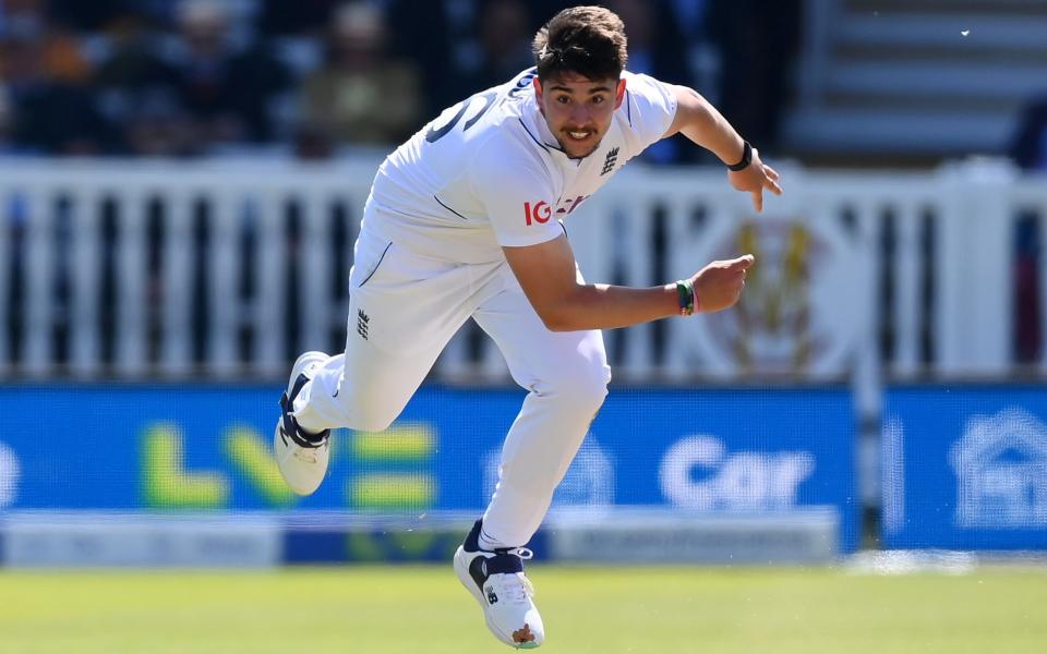 Josh Tongue bowling for England against Ireland last summer/Josh Tongue ruled out until summer after suffering fresh injury setback