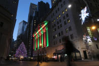 <p> FILE - In this Dec. 11, 2018, file photo, the New York Stock Exchange is bathed in holiday light, in New York. U.S. stocks are slightly lower Thursday morning, Dec. 20, a day after another big plunge rocked markets around the world. Asian and European indexes suffered bigger losses. Stocks have tumbled as investors grow increasingly worried the U.S. could slip into a recession in the next few years. (AP Photo/Mark Lennihan, File) </p>