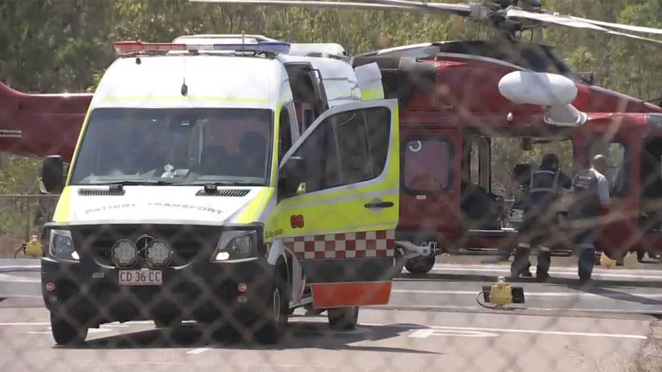 First responders carry out a rescue mission following the crash. - AuBC/AP