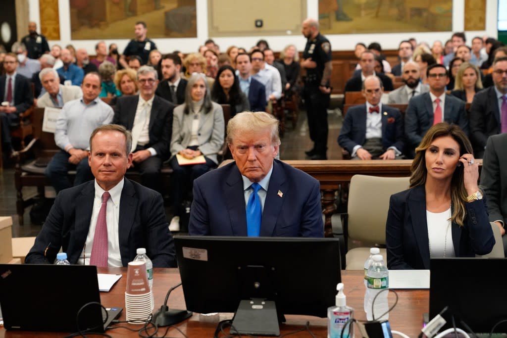 Former U.S. President Donald Trump (center) attends the trial of himself, his adult sons, the Trump Organization, and others in a civil fraud case brought by state Attorney General Letitia James, at a Manhattan courthouse on Oct. 2, 2023, in New York City. (Photo by SETH WENIG/POOL/AFP via Getty Images)