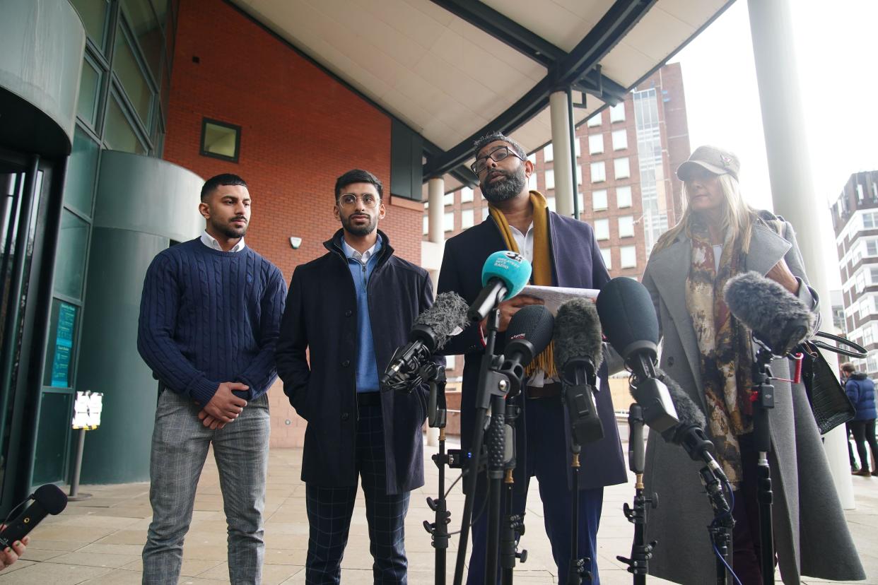 Mohammed Ramzan (second right), who was accused of trafficking by Eleanor Williams, with Nicola Holt (right), outside Preston Crown Court, Lancashire, where Williams was jailed for eight-and-a-half years for nine counts of perverting the course of justice after she claimed to have been the victim of an Asian grooming gang. Williams, 22, published pictures of her injuries and an account of being groomed, trafficked and beaten, on Facebook in May 2020, in a post which was shared more than 100,000 times. Picture date: Tuesday March 14, 2023.