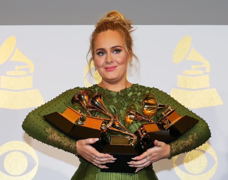 Adele with her five Grammys in 2017 - Mike Blake/Reuters 