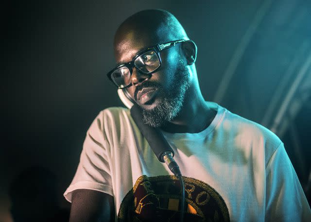 <p>LUCA SOLA/AFP via Getty</p> DJ Black Coffee performs in Johannesburg in March 2021