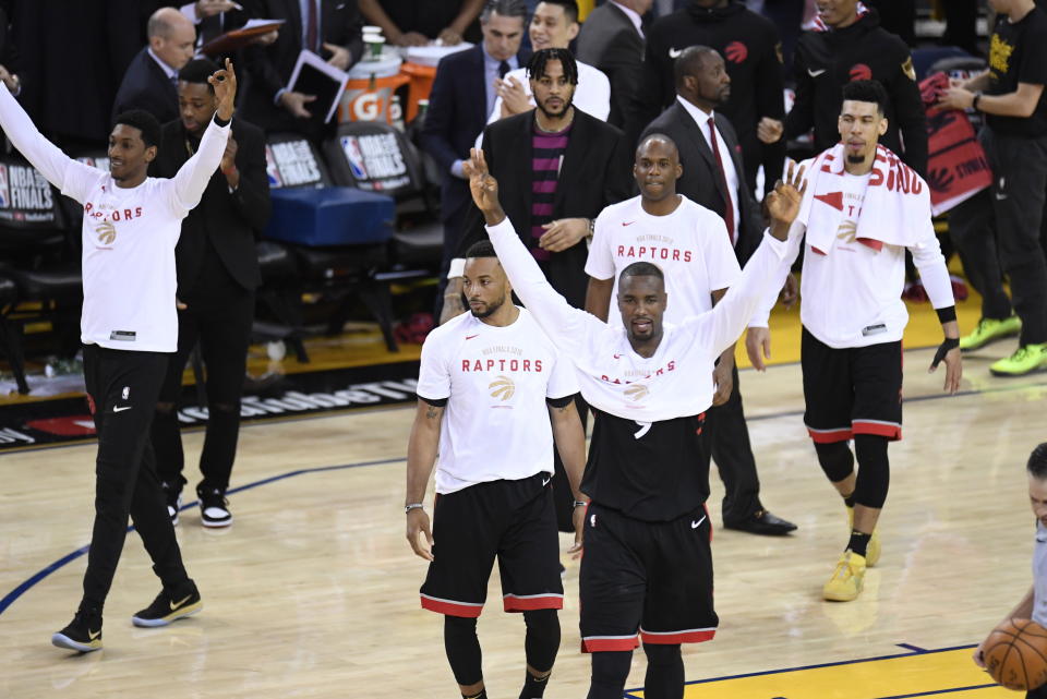 Toronto Raptors celebrate defeating the Golden State Warriors during Game 3 of basketball’s NBA Finals, Wednesday, June 5, 2019, in Oakland, Calif. (Frank Gunn/The Canadian Press via AP)