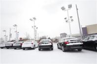 A row Chrysler 200s sit in the parking lot at Bill Snethkamp dealership in Detroit, Michigan January 2, 2014. REUTERS/Joshua Lott