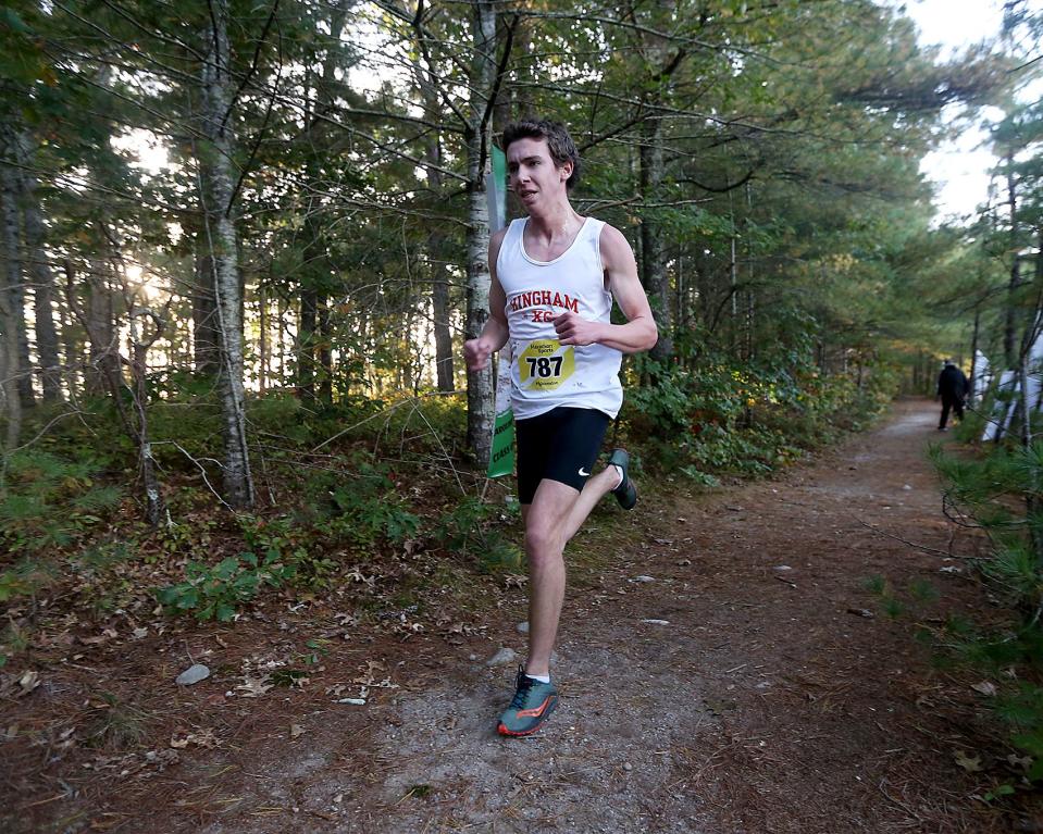 Hingham's Brendan Burm finishes strong to take second overall in their meet against Marshfield at Marshfield High on Wednesday, Oct. 12, 2022. Marshfield girls would win 19-39 while Marshfield boys won 19-44.