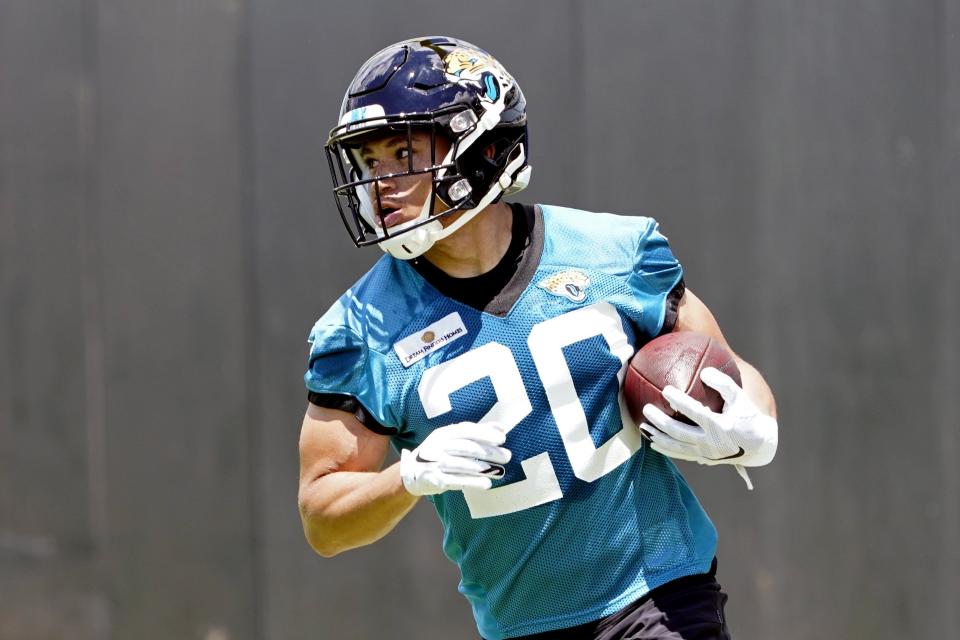 Jacksonville Jaguars running back Trey Smith III runs through a drill during NFL football rookie minicamp, Friday, May 13, 2022, in Jacksonville, Fla. (AP Photo/John Raoux)