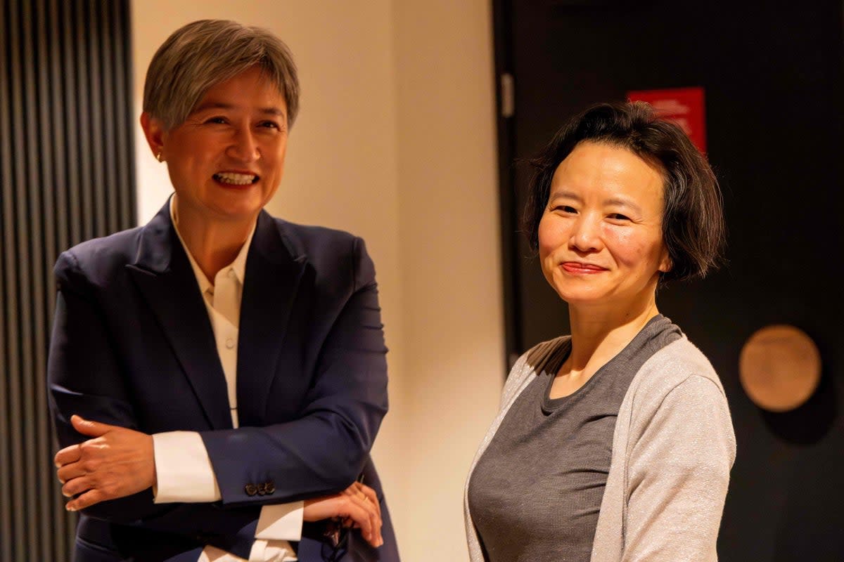 Australian foreign minister Penny Wong  speaking with journalist Cheng Lei upon her arrival at the airport in Melbourne (Handout)
