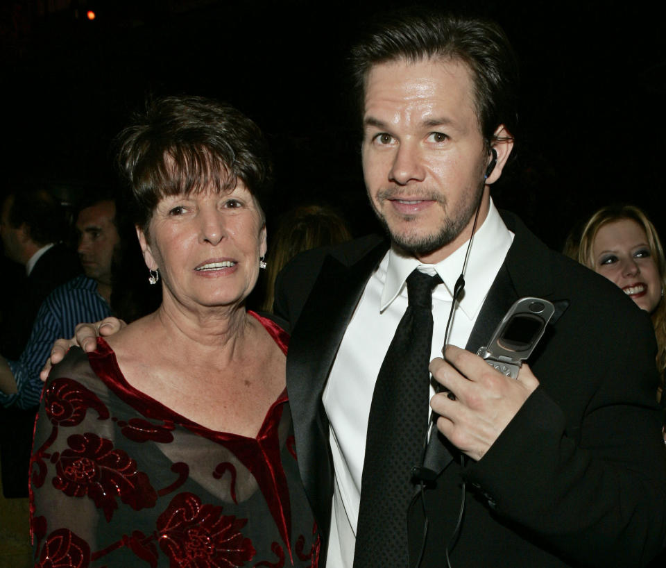 FILE - In this Sunday, Jan. 16, 2005, file photo, Mark Wahlberg, executive producer of the HBO series "Entourage," and his mother Alma pose at the HBO party after the 62nd Annual Golden Globe Awards, in Beverly Hills, Calif. Alma Wahlberg, the mother of entertainers Mark and Donnie Wahlberg and a regular on their reality series "Wahlburgers", has died, her sons said on social media Sunday, April 18, 2021. She was 78. "My angel. Rest in peace," Mark Wahlberg tweeted. (AP Photo/Lisa Rose, File)