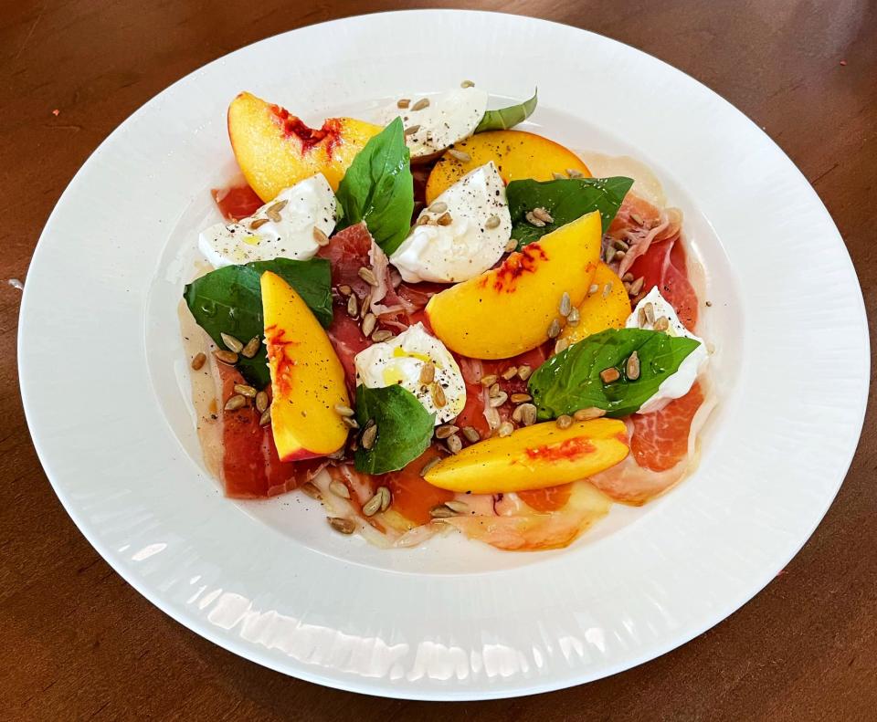 Peaches and Buratta with Surryano ham, maple and black pepper vinegar, basil and sunflower seeds is among the seasonal dishes at Argyle, a new upscale restaurant offering contemporary American fare focused on fresh Florida ingredients, opening Tuesday, Aug. 8 at The Yards in Ponte Vedra Beach.
