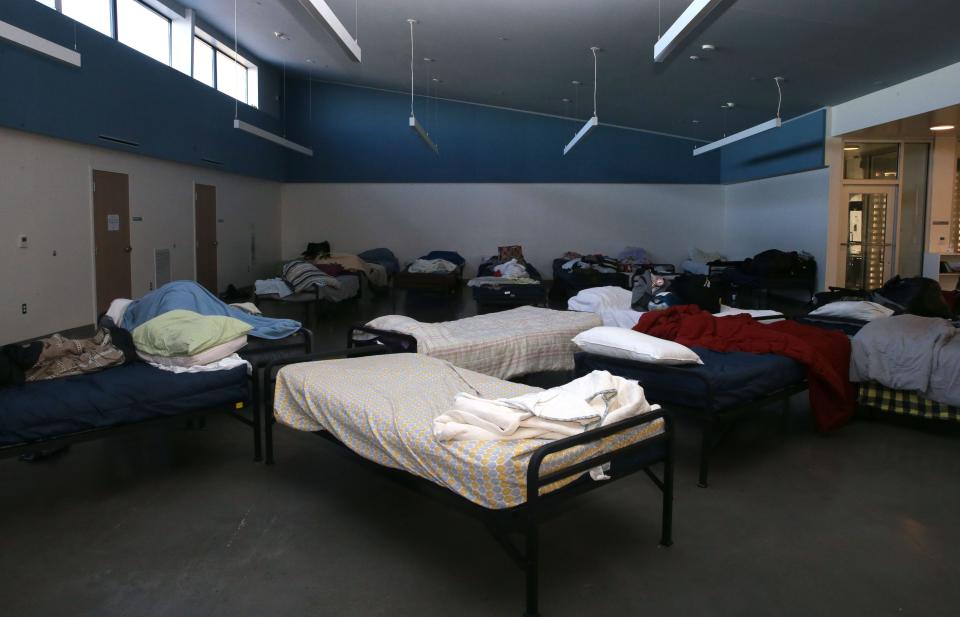 Beds are arranged at Shelter House's winter emergency shelter Tuesday, Dec. 12, 2023 in Iowa City, Iowa. The building, which operates December through March, was at capacity opening night.