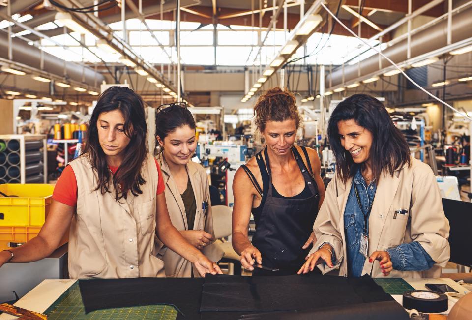 Leather goods workers in Louis Vuitton’s Ateliers de la Drôme workshop. - Credit: Olivier Pilcher/Courtesy of Louis Vuitton