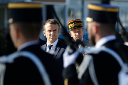 French President Emmanuel Macron and Chief of the Defence Staff French Army General Pierre de Villiers attend a visit to the Ile Longue Defence unit, submarine navy base, in Crozon near Brest, western France, July 4, 2017. REUTERS/Stephane Mahe