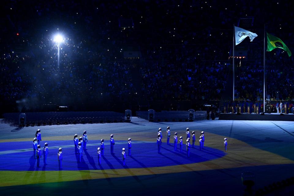 <p>The Brazil national anthem is sung by a children’s choir during the Closing Ceremony on Day 16 of the Rio 2016 Olympic Games at Maracana Stadium on August 21, 2016 in Rio de Janeiro, Brazil. (Photo by David Ramos/Getty Images) </p>