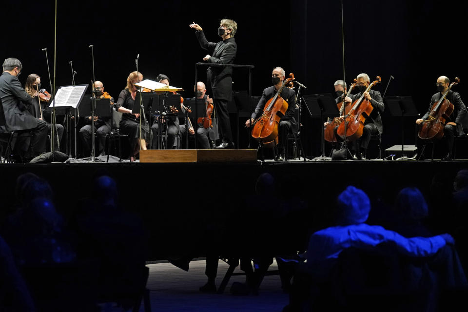 CORRECTS SPELLING OF FIRST NAME TO ESA INSTEAD OF ESSA - Guest conductor Esa-Pekka Salonen, music director of the San Francisco Symphony and principal conductor of London's Philharmonia Orchestra, leads the New York Philharmonic as the group performed together before a live audience of 150 people for the first time since March 10, 2020, at The Shed in Hudson Yards, Wednesday, April 14, 2021, in New York. (AP Photo/Kathy Willens)