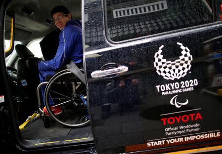 Paralympian Daniel Romanchuk of the U.S. rides in a Toyota Motor Corp.'s JPN Taxi during his tour of Tokyo, Japan March 4, 2019. REUTERS/Issei Kato