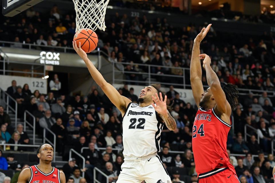 Providence guard Devin Carter goes in for a layup against St. John's during the first half at Amica Mutual Pavilion on Tuesday.