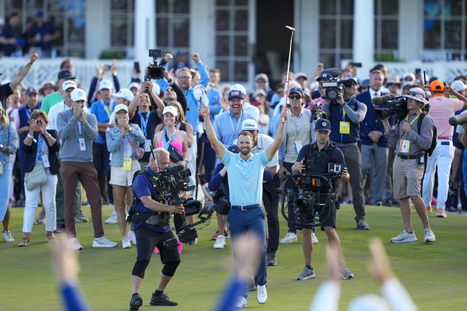 Wyndham Clark celebrates on the 18th hole after winning the U.S. Open golf tournament at Los Angeles Country Club on Sunday, June 18, 2023, in Los Angeles. (AP Photo/Lindsey Wasson)