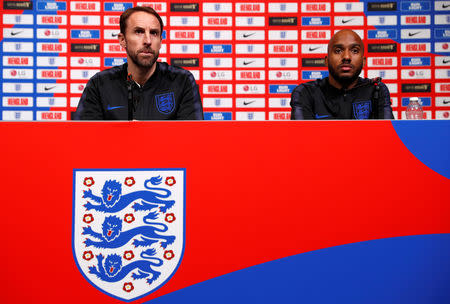 Soccer Football - England Press Conference - Wembley Stadium, London, Britain - November 14, 2018 England manager Gareth Southgate and England's Fabian Delph during the press conference Action Images via Reuters/John Sibley
