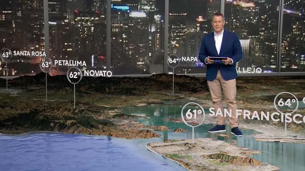  KPIX San Francisco chief meterologist Paul Heggen delivers a forecast on the station’s virtual reality set. . 