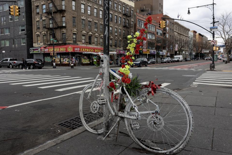 One of three memorial ‘ghost bikes’ on a single block in the Bronx, New York, April 6, 2024, memorializing delivery workers killed in traffic accidents. <a href="https://www.gettyimages.com/detail/news-photo/memorial-ghost-bike-stands-in-memory-of-delivery-worker-news-photo/2148851212" rel="nofollow noopener" target="_blank" data-ylk="slk:Andrew Lichtenstein/Corbis via Getty Images;elm:context_link;itc:0;sec:content-canvas" class="link ">Andrew Lichtenstein/Corbis via Getty Images</a>