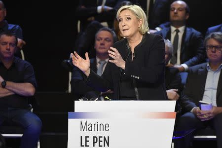 Marine Le Pen of French National Front (FN) attends a prime-time televised debate for the candidates at French 2017 presidential election in La Plaine Saint-Denis, near Paris, France, April 4, 2017. REUTERS/Lionel Bonaventure/Pool