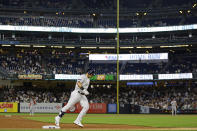 New York Yankees' Jasson Dominguez rounds third base after hitting a home run during the third inning of a baseball game against the Detroit Tigers, Wednesday, Sept. 6, 2023, in New York. (AP Photo/Adam Hunger)