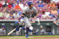 New York Mets' Jeff McNeil watches his RBI single during the first inning of the team's baseball game against the Cincinnati Reds on Wednesday, July 6, 2022, in Cincinnati. (AP Photo/Jeff Dean)