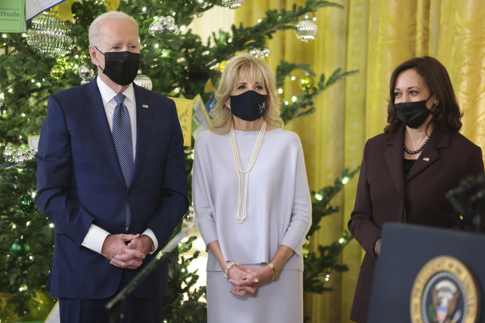 President Joe Biden, First Lady Jill Biden and Vice President Kamala Harris attend the Menorah lighting in the East Room of the White House. - Credit: Sipa USA via AP