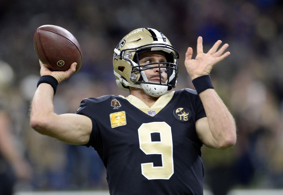 New Orleans Saints quarterback Drew Brees (9) warms up before an NFL football game against the Los Angeles Rams in New Orleans, Sunday, Nov. 4, 2018. (AP Photo/Bill Feig)