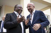 Charles Michel, President of the EU Council, right, speaks with Cyril Ramaphosa, President of South Africa, left, during the G7 leaders summit at Castle Elmau in Kruen, near Garmisch-Partenkirchen, Germany, Monday, June 27, 2022. The Group of Seven leading economic powers are meeting in Germany for their annual gathering Sunday through Tuesday. (Michael Kappeler/Pool via AP)