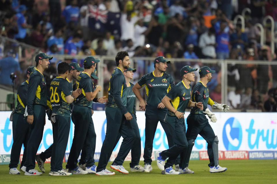 Australia players walk out on to the field at the start of the second T20 cricket match between India and Australia in Thiruvananthapuram, India, Sunday, Nov. 26, 2023. (AP Photo/Aijaz Rahi)