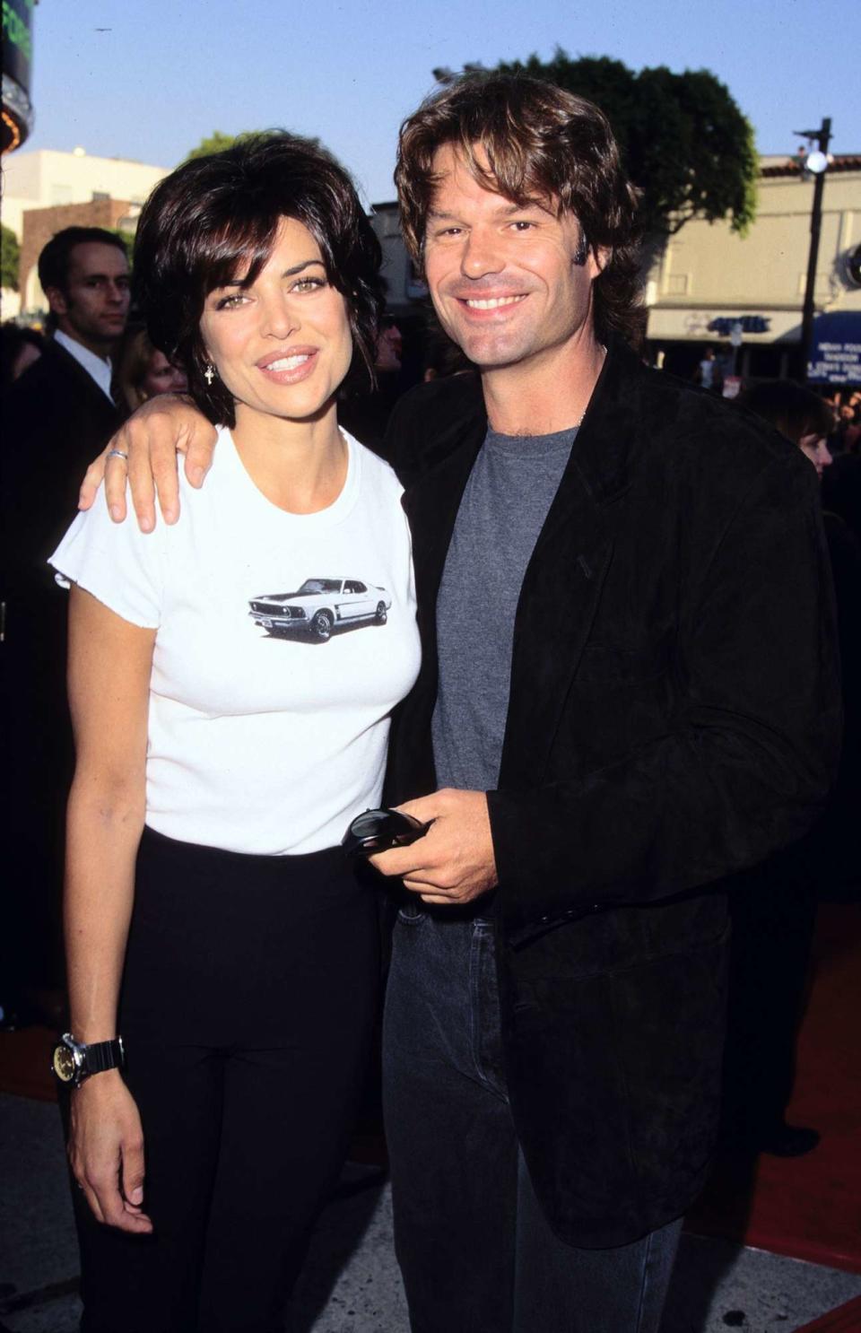 Lisa Rinna and Harry Hamlin during "Batman Forever" Los Angeles Premiere at Mann's Village Theater in Westwood, California, United States