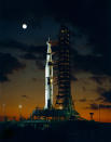 The giant Saturn V rocket for the Apollo 4 mission at the Kennedy Space Center's launch complex 39A stands at the dawn of November 8, 1967, during the pre-launch alert.