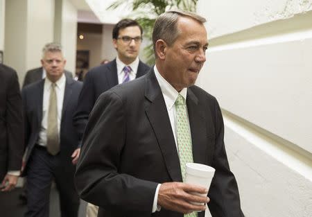 Speaker of the House John Boehner (R-OH) arrives for a Republican caucus meeting at the Capitol in Washington, in this August 1, 2014 file photo. REUTERS/Joshua Roberts/Files