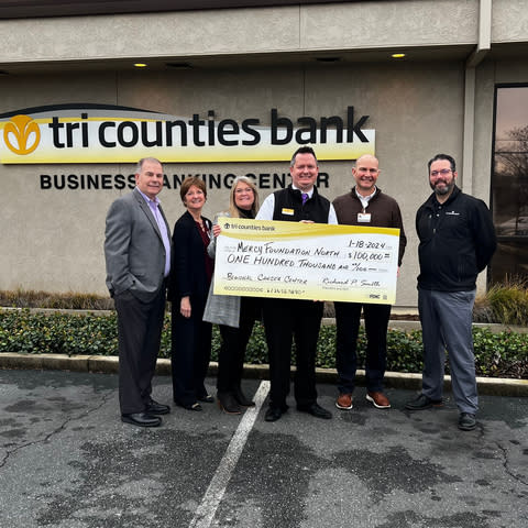 Tri Counties Bank presents a $100,000 check to Mercy Foundation North to support the new Regional Cancer Center in Redding, California. Pictured from left to right: Rick Smith, President and CEO at Tri Counties Bank; Michelle Martin Streeby, Director of Philanthropy at Mercy Foundation North; Danna Prater, Director of Community Development at Tri Counties Bank; Joe Cullis, Regional Manager at Tri Counties Bank; Jake Mangas, President and Chief Philanthropy Officer at Mercy Foundation North; and Drew Costa, Community Development Officer at Tri Counties Bank. (Photo: Business Wire)