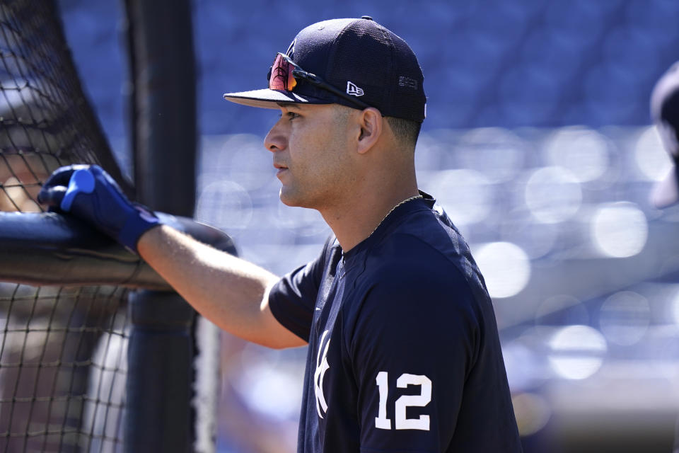 New York Yankees third baseman Isiah Kiner-Falefa (12) warms up before a spring training baseball game against the Philadelphia Phillies, Friday, March 25, 2022, in Clearwater, Fla. (AP Photo/Lynne Sladky)