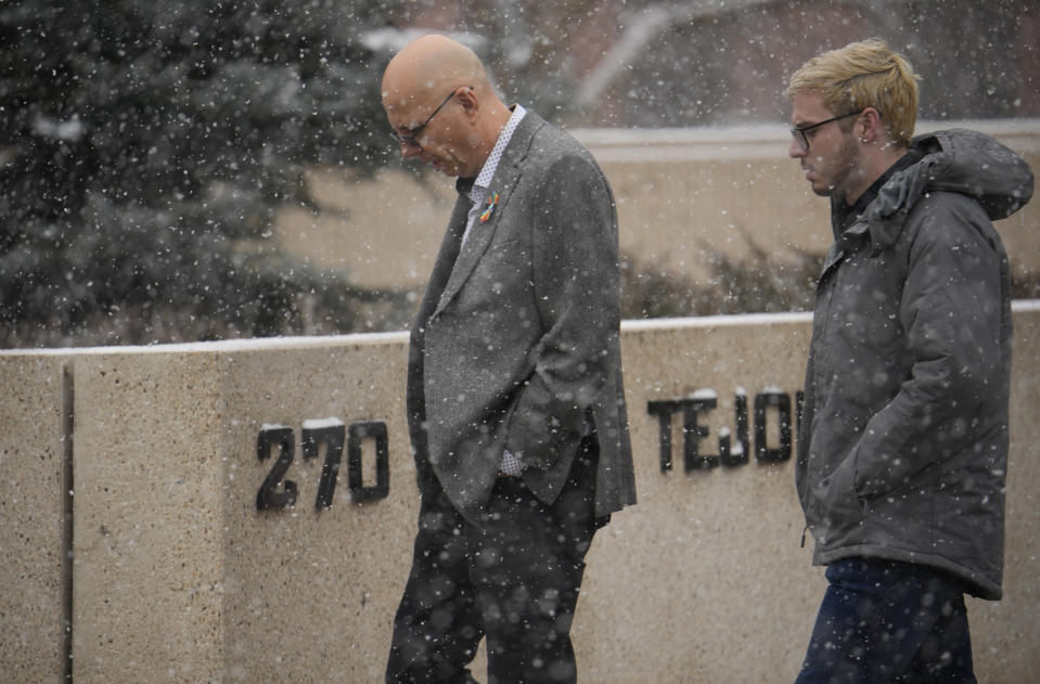Matthew Haynes, co-owner of Club Q, left, walks with Michael Anderson, a survivor of the mass shooting at the nightclub, back into the El Paso County courthouse after a lunch break in a preliminary hearing for the alleged shooter in the Club Q mass shooting Wednesday, Feb. 22, 2023, in Colorado Springs, Colo. (AP Photo/David Zalubowski)