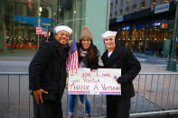 <p>Personnel from the United States Navy pose for a photo with a spectator during the Veterans Day parade in New York City on Nov. 11, 2017. (Photo: Gordon Donovan/Yahoo News) </p>