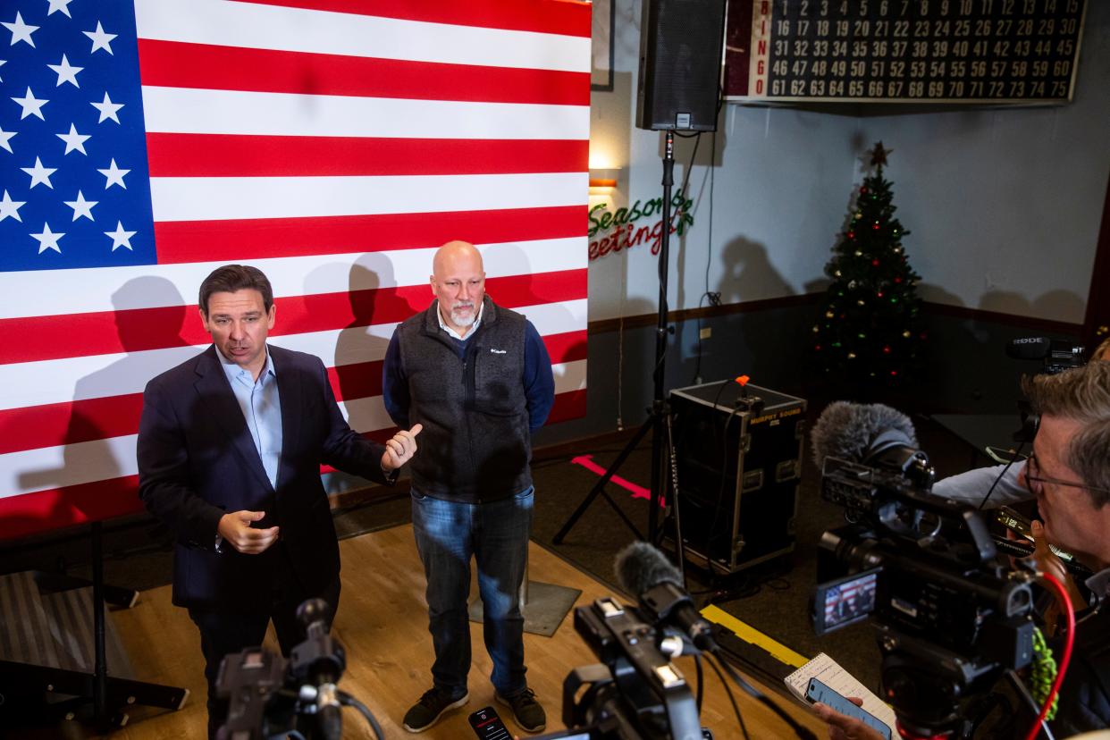 Florida Gov. Ron DeSantis and Rep. Chip Roy, R-Texas, speak with the press during a meet and greet event at VFW Post 788 in Cedar Rapids, Iowa on Tuesday, Dec. 19, 2023. Florida Gov. Ron DeSantis and Rep. Chip Roy, R-Texas, spoke to community members and held a question and answer session. (Nick Rohlman/The Gazette via AP)