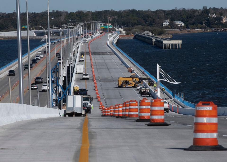 Construction crews work to wrap up work on the westbound span of the new Gen. Daniel "Chappie" James, Jr. Bridge on Friday, Feb. 3, 2023. FDOT officials are expecting to open the westbound span to traffic on or around Feb. 13, 2023.