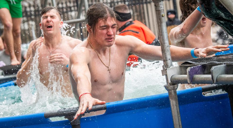 Bloomington North student Jackson Jent tries to find his way out after his jump into the cold water at the 2024 Polar Plunge benefitting Special Olympics Indiana at Memorial Stadium on Saturday, Feb. 24, 2024.