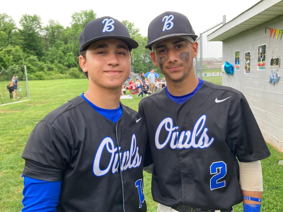 Bensalem's Richi Sanchez, left, and friend/translator Yahil Almodovar take a moment during Saturday's 5-1 non-conference win over Springfield-Montco.