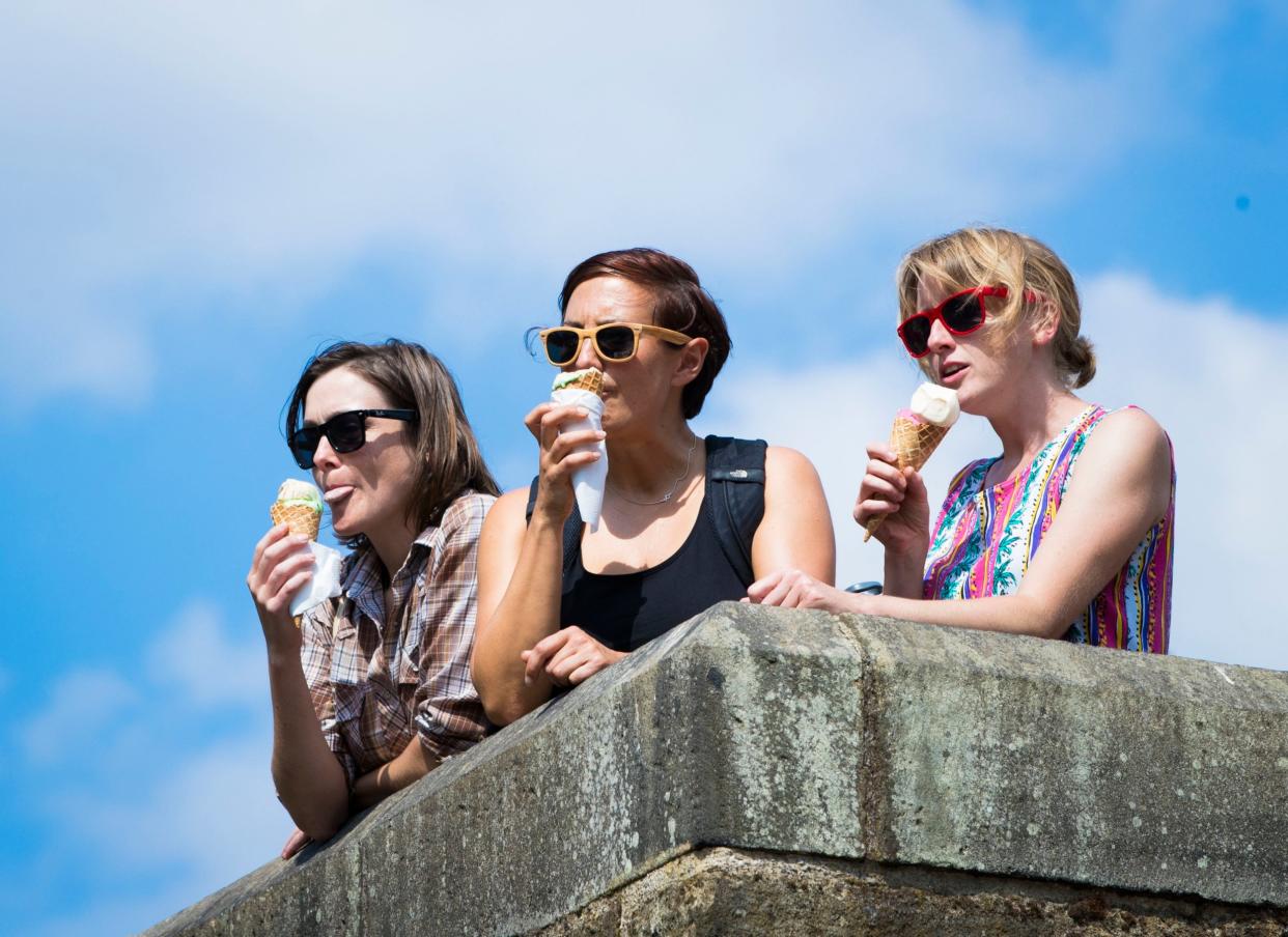 Women enjoy an ice cream in West Yorkshire: PA