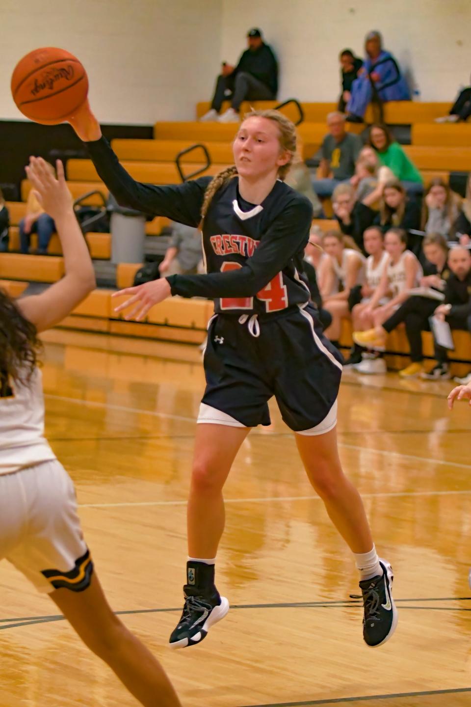 Crestview's Emma Aumend dishes the ball inside to a teammate.