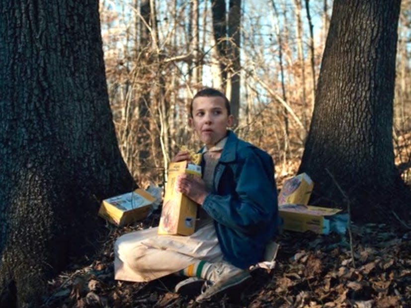 Eleven eating waffles in the woods Stranger Things 