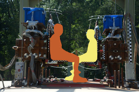 This handout photo of an Army experiment at Aberdeen Proving Ground in Aberdeen, Maryland, U.S., obtained by Reuters in September 2016, shows cadavers being used to test the impact of explosions on the human body. The photograph has been modified by the military to show only a blank outline of the cadavers, one colored orange, the other yellow. U.S. Army/Handout via REUTERS