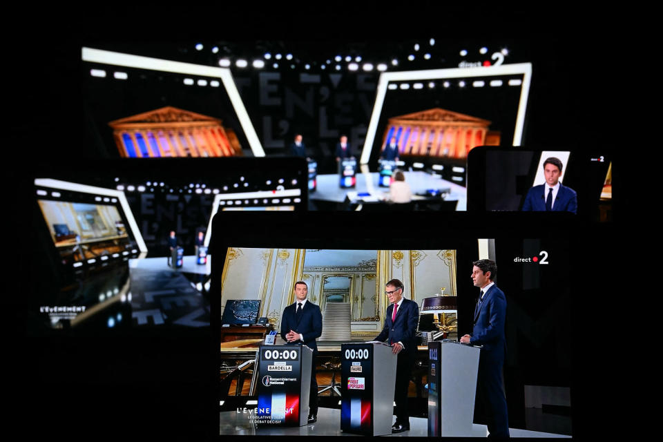 First secretary of the French left-wing Socialist Party, Olivier Faure.  in the center, the French president of the far-right Rassemblement National party, Jordan Bardella, left, and French Prime Minister Gabriel Attal, right, on June 27, 2024. (Sebastien Bozon / AFP - Getty Images)